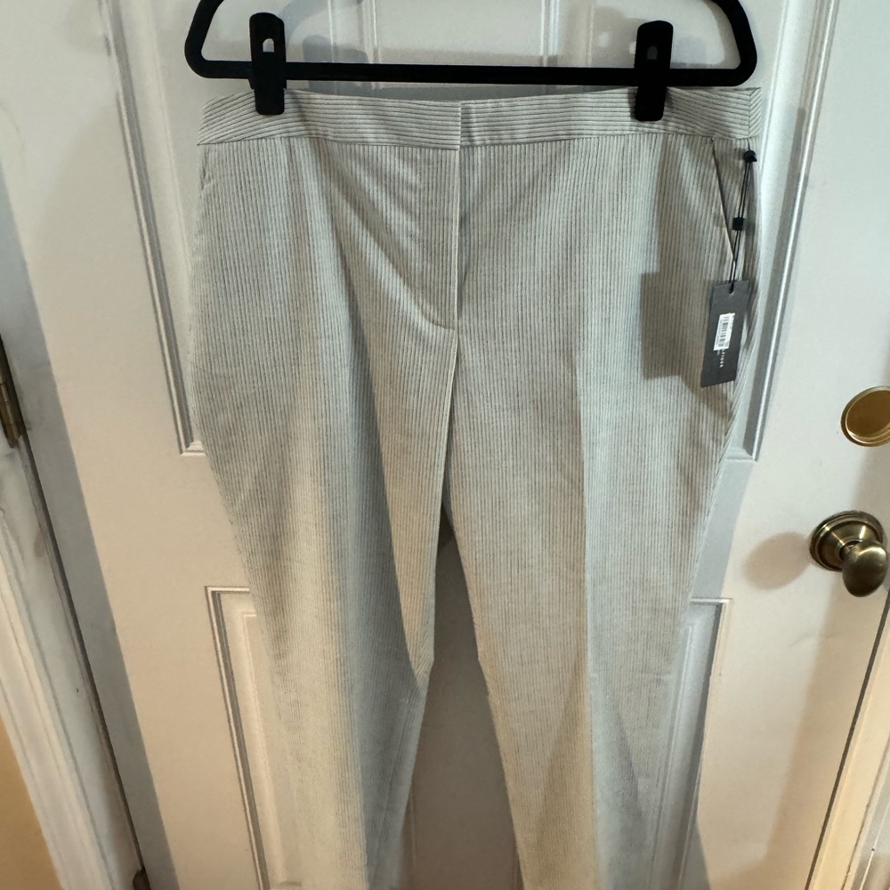 NWT- Never worn with Tags. Tommy Hilifiger women’s size 14 poplin pants.